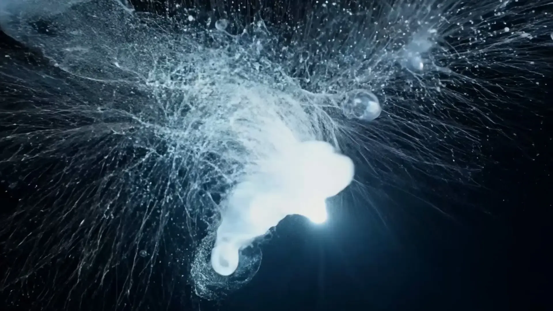 Swirling Particle Cloud and Light Burst Video Overlay